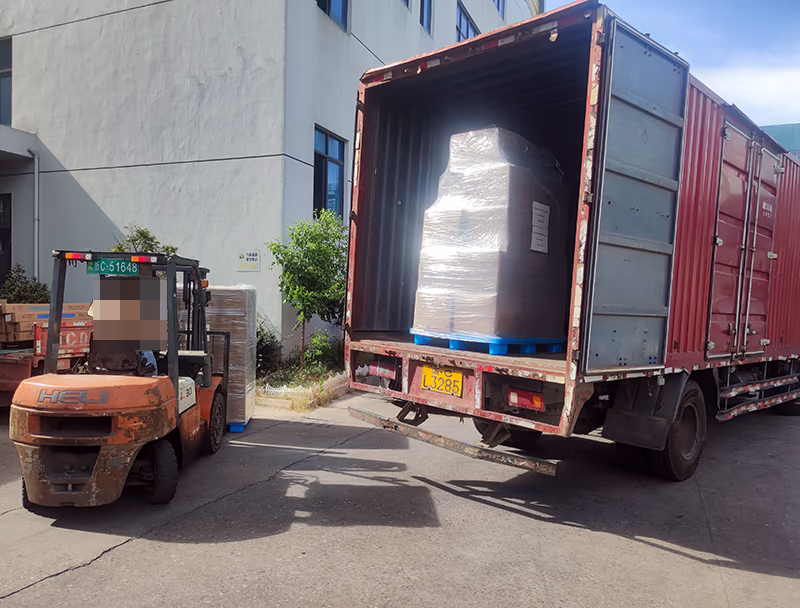 Forklift loading explosion-proof equipment pallets into truck
